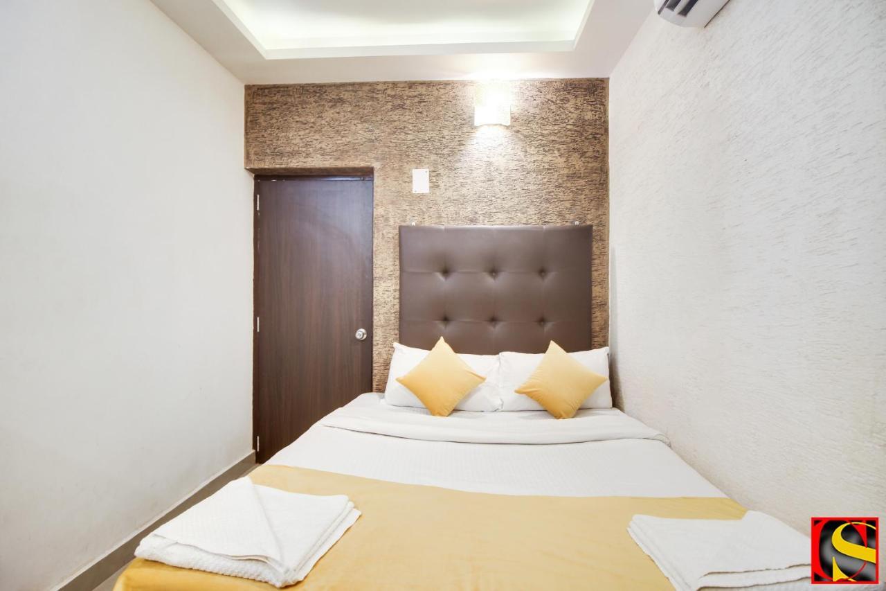 Candolim Sands Hotel Bagian luar foto